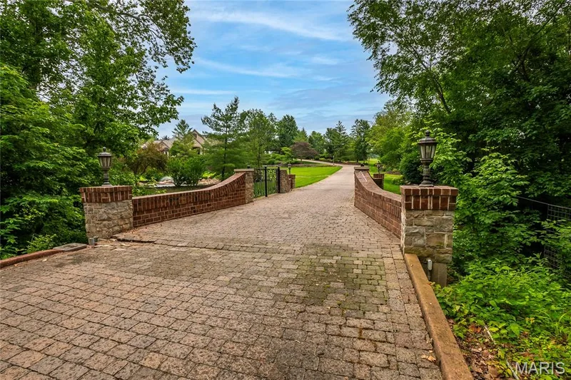 Paver stone driveway leading to the house — 4 Slate River Way, Wentzville, MO 63385