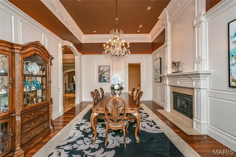 The doorway on the right in the rear of this photo leads to the Butler's Pantry w/warming drawers. — 4 Slate River Way, Wentzville, MO 63385