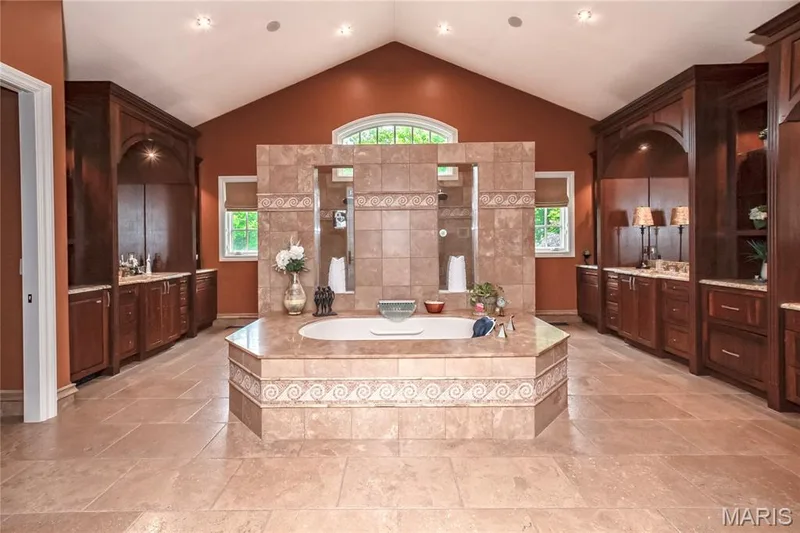 The Master Bath        en-suite's main feature upon entering is this inviting oversize jetted tub. — 4 Slate River Way, Wentzville, MO 63385