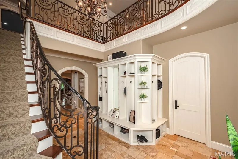 This photo is of the Front Side entry mud room where you can drop all your gear. It is just off the hall that leads to the kitchen. but also close to the 2nd laundry room & access to the 4 car attached garage — 4 Slate River Way, Wentzville, MO 63385