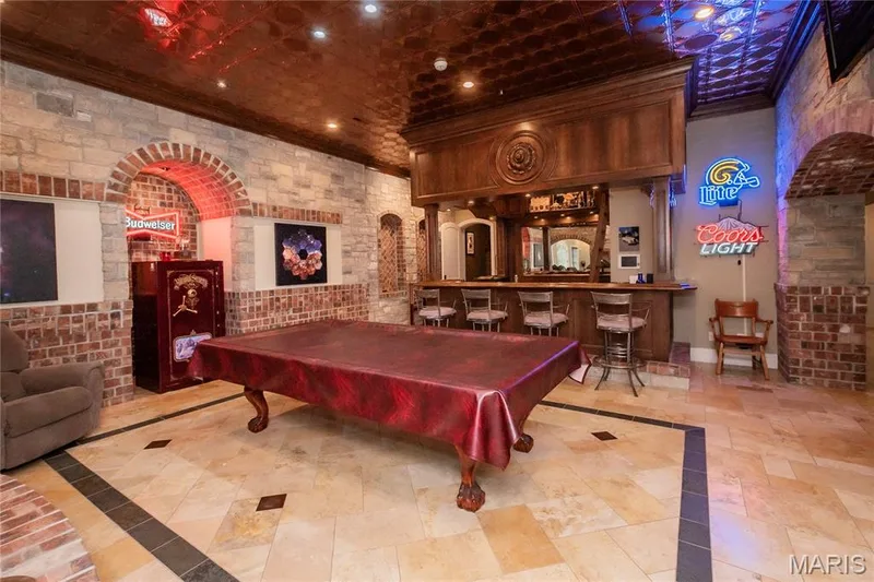The polished natural stone floor has slate inlay — 4 Slate River Way, Wentzville, MO 63385