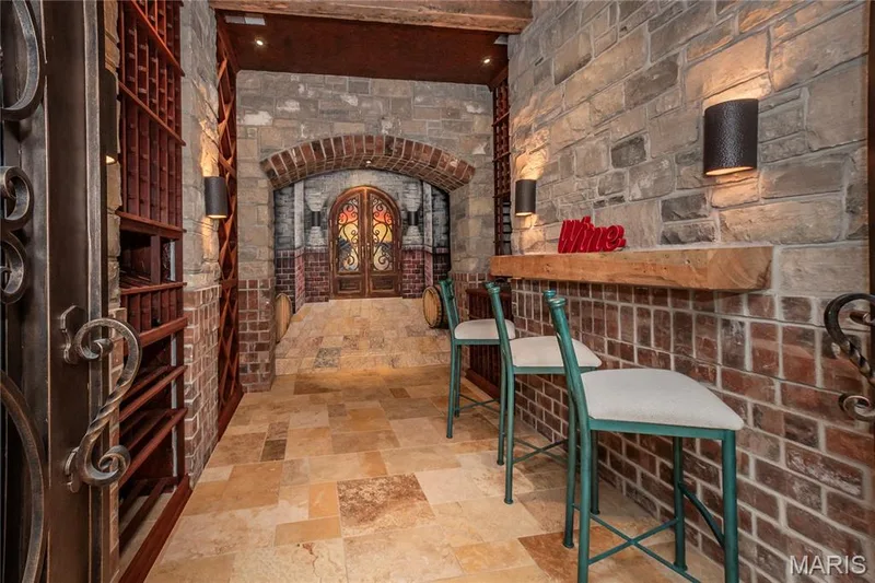 Besides this quaint tasting area, this room is climate controlled to keep your wines fresh — 4 Slate River Way, Wentzville, MO 63385