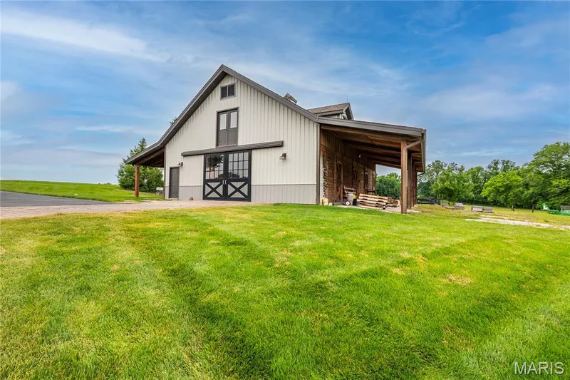 The 4 stall horse barn  which has an outdoor riding arena — 4 Slate River Way, Wentzville, MO 63385