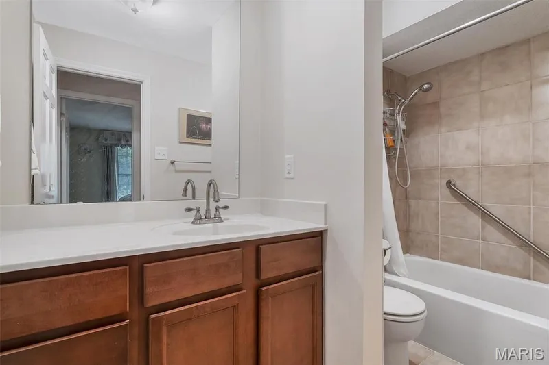 Bathroom with vanity and shower / tub combination — 1511 Hampton Hall Drive #19 & 20, Chesterfield, MO 63017