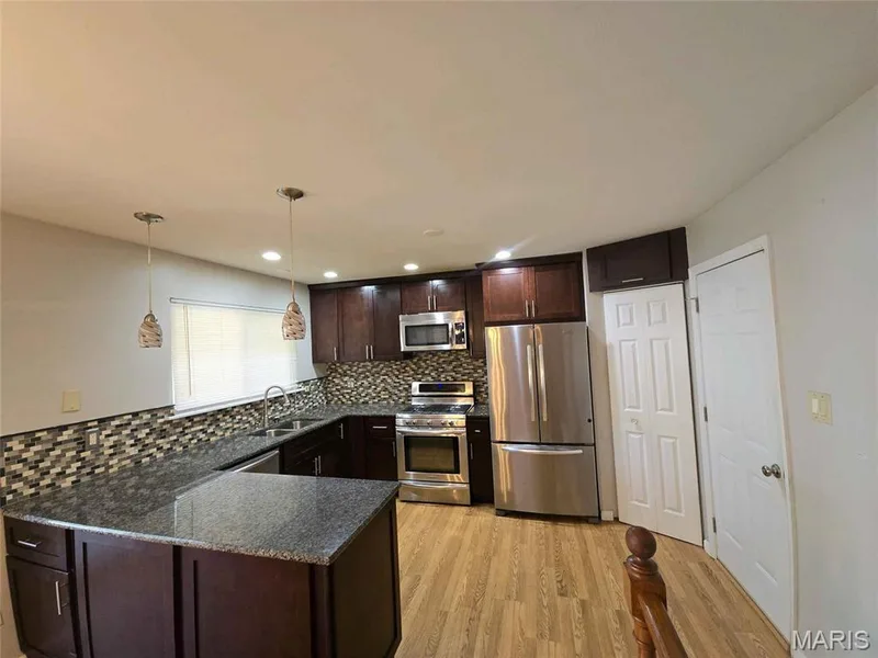 1218 Saddlemaker Drive, St Charles, MO 63304 — listing photo 2 of 17