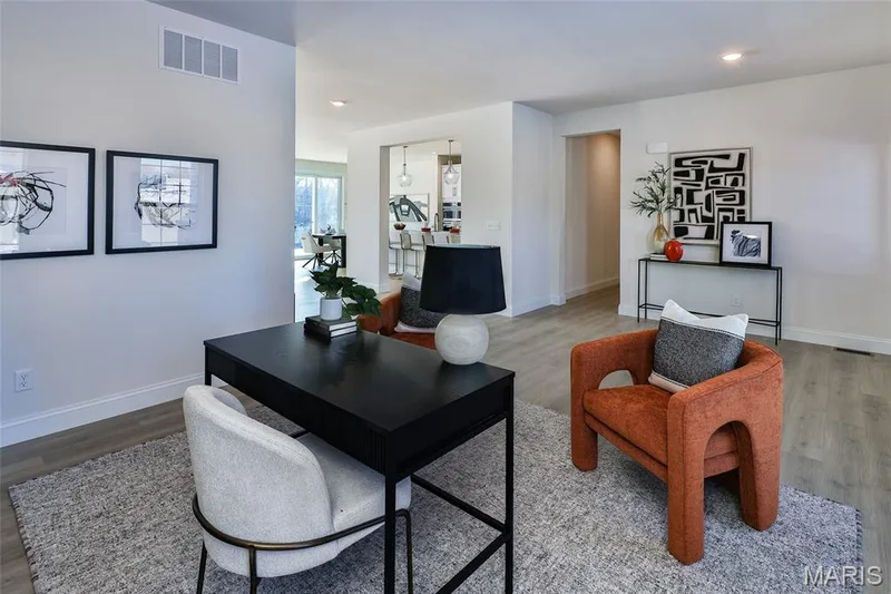 Living area featuring wood finished floors and recessed lighting — 0 Bridgeport - Montage at Hawk Ridge, Lake St. Louis, MO 63367