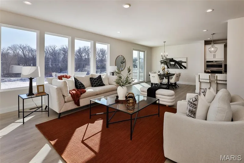 Living area featuring recessed lighting, light wood-type flooring, and a chandelier — 0 Bridgeport - Montage at Hawk Ridge, Lake St. Louis, MO 63367