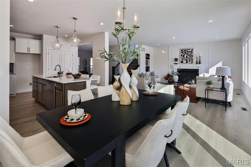 Dining space with light wood-style floors, a fireplace, and recessed lighting — 0 Bridgeport - Montage at Hawk Ridge, Lake St. Louis, MO 63367