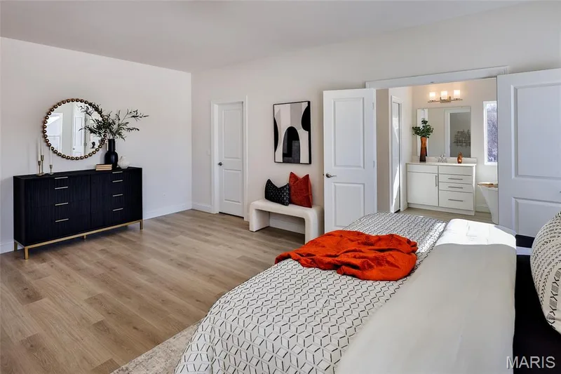 Bedroom featuring light wood finished floors and baseboards — 0 Bridgeport - Montage at Hawk Ridge, Lake St. Louis, MO 63367