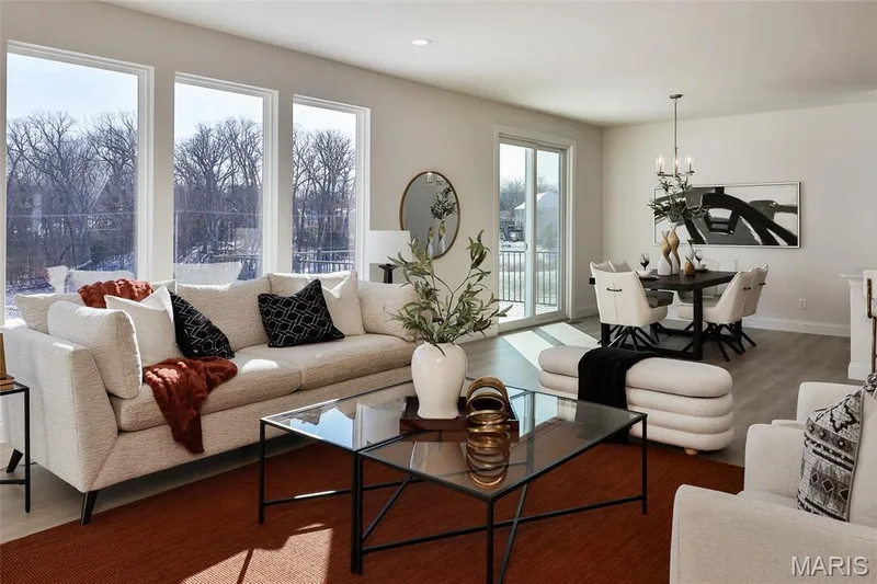 Living area featuring wood finished floors, a chandelier, and recessed lighting — 0 Bridgeport - Montage at Hawk Ridge, Lake St. Louis, MO 63367