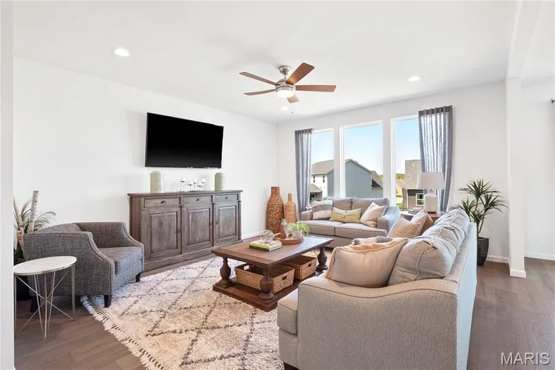 Living room featuring wood finished floors, recessed lighting, and a ceiling fan — 0 Chesapeake @ Montage at Hawk Ridge, Lake St. Louis, MO 63367