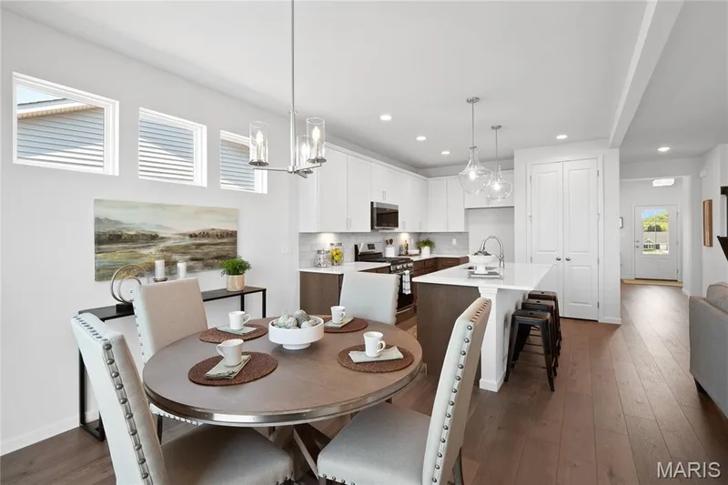Dining area with dark wood-type flooring, a chandelier, and recessed lighting — 0 Chesapeake @ Montage at Hawk Ridge, Lake St. Louis, MO 63367