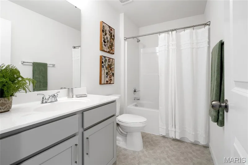 Bathroom featuring shower / bath combo and vanity — 0 Chesapeake @ Montage at Hawk Ridge, Lake St. Louis, MO 63367