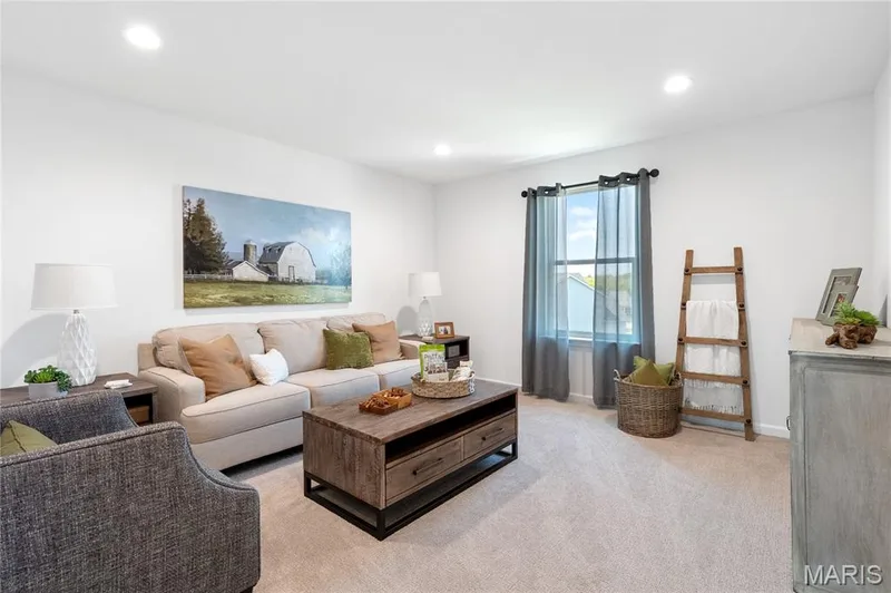 Living area with light carpet and recessed lighting — 0 Chesapeake @ Montage at Hawk Ridge, Lake St. Louis, MO 63367