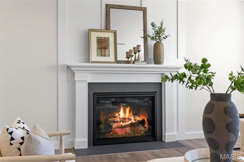 Detailed view of wood finished floors and a glass covered fireplace — 0 Lancaster @ Montage at Hawk Ridge, Lake St. Louis, MO 63367