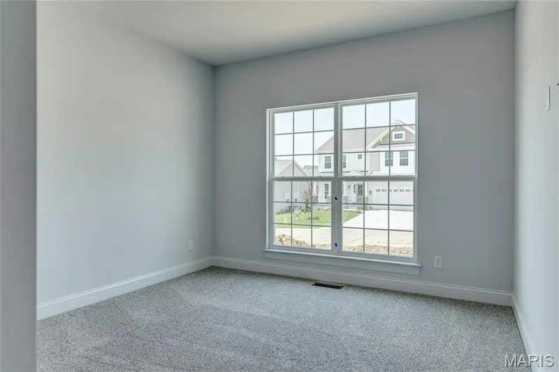 Empty room featuring carpet and baseboards — 0 Pierce @ Montage at Hawk Ridge, Lake St. Louis, MO 63367