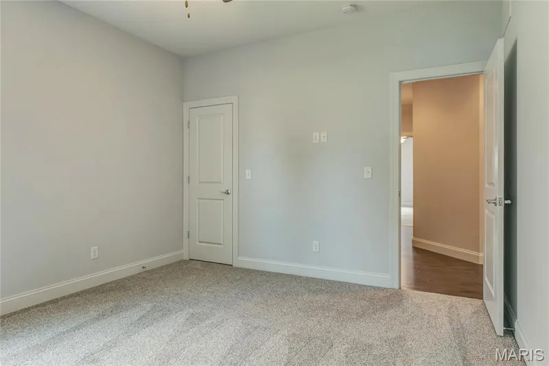 Unfurnished bedroom featuring carpet and baseboards — 0 Pierce @ Montage at Hawk Ridge, Lake St. Louis, MO 63367