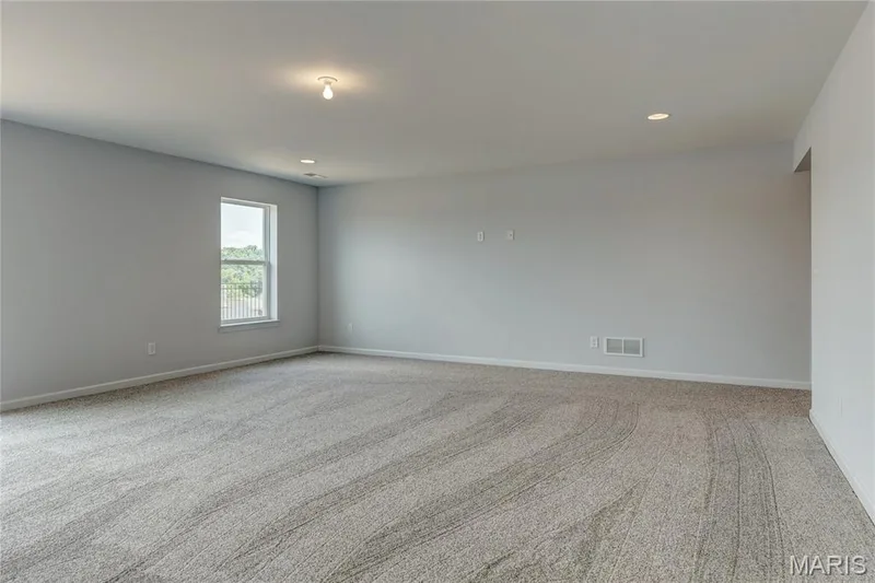 Empty room with light carpet and recessed lighting — 0 Pierce @ Montage at Hawk Ridge, Lake St. Louis, MO 63367