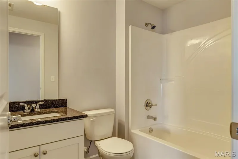 Full bathroom featuring shower / bathtub combination and vanity — 0 Pierce @ Montage at Hawk Ridge, Lake St. Louis, MO 63367
