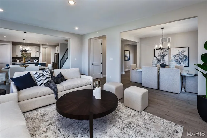 Living room featuring a chandelier, wood finished floors, and recessed lighting — 0 Windsor @ Montage at Hawk Ridge, Lake St. Louis, MO 63367