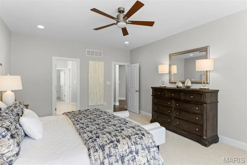 Bedroom featuring light carpet, ceiling fan, and recessed lighting — 2 Pin Oak at Hawk Ridge Estate, Lake St. Louis, MO 63367