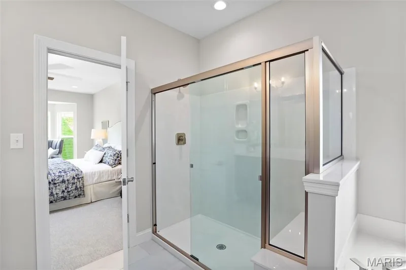 Ensuite bathroom with a shower stall and recessed lighting — 2 Pin Oak at Hawk Ridge Estate, Lake St. Louis, MO 63367
