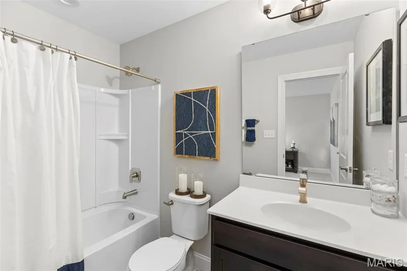 Full bathroom with shower / bath combination with curtain and vanity — 2 Pin Oak at Hawk Ridge Estate, Lake St. Louis, MO 63367