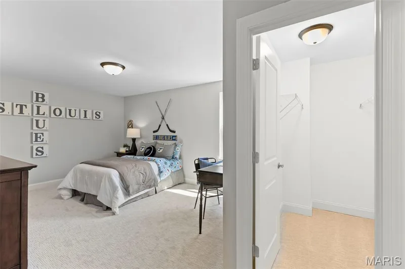 Bedroom featuring light carpet — 2 Pin Oak at Hawk Ridge Estate, Lake St. Louis, MO 63367