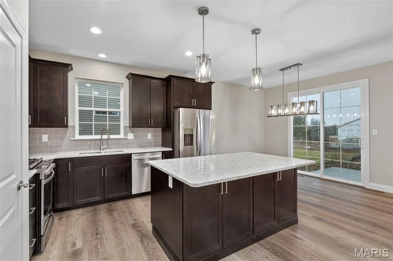 Photo representation of similar home.  Some features shown may be optional upgrades. — 1 TBB Lansford 2 Car @ The Villages at Post Farms, O'Fallon, MO 63385
