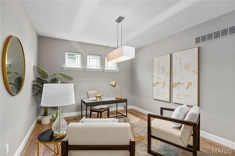 Third bedroom is shown as a Den/Office.  Photo representation of similar home. Some features shown may be optional upgrades. — 1 TBB Whitehall 3 Car @ The Villages at Post Farms, O'Fallon, MO 63385