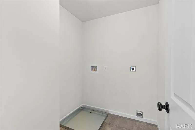 Laundry area featuring hookup for an electric dryer and hookup for a washing machine — 563 Edison Way, Wentzville, MO 63385