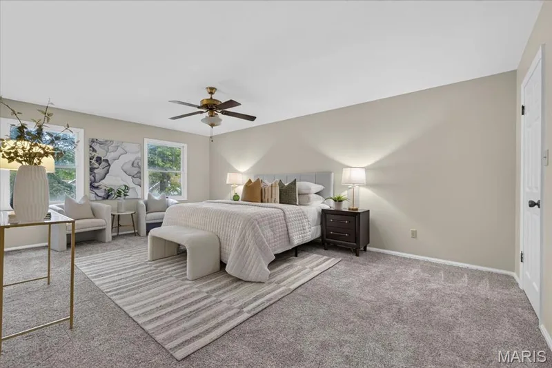 Expansive primary bedroom suite featuring a walk-in closet and private bath! — 14529 Brittania Drive, Chesterfield, MO 63017