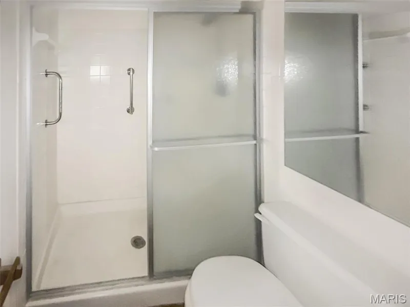 Full bath with toilet and a stall shower — 312 Crown Colony Court #F, St Peters, MO 63376