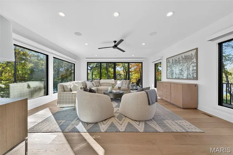 Sun room with Pella windows and doors overlooking the lake.  Amazing views, come see for yourself! — 22 Holloway Drive, Lake St. Louis, MO 63367