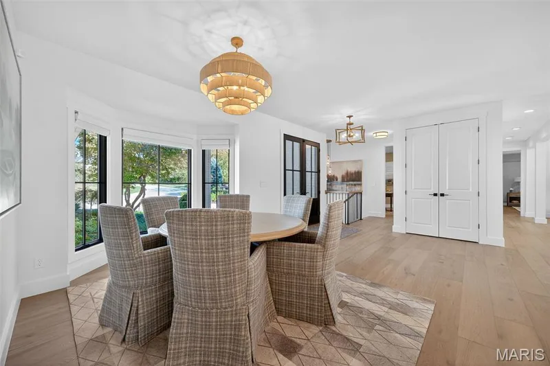 Dining room open to the kitchen — 22 Holloway Drive, Lake St. Louis, MO 63367