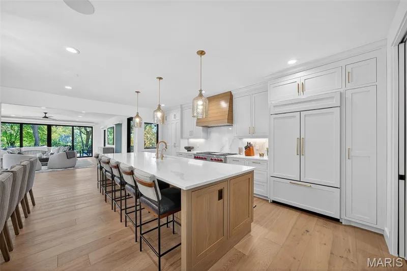 From kitchen looking into the sun room — 22 Holloway Drive, Lake St. Louis, MO 63367