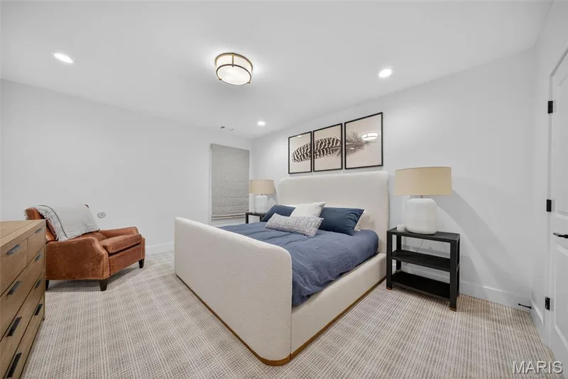 Lower level bedroom with walk in closet — 22 Holloway Drive, Lake St. Louis, MO 63367