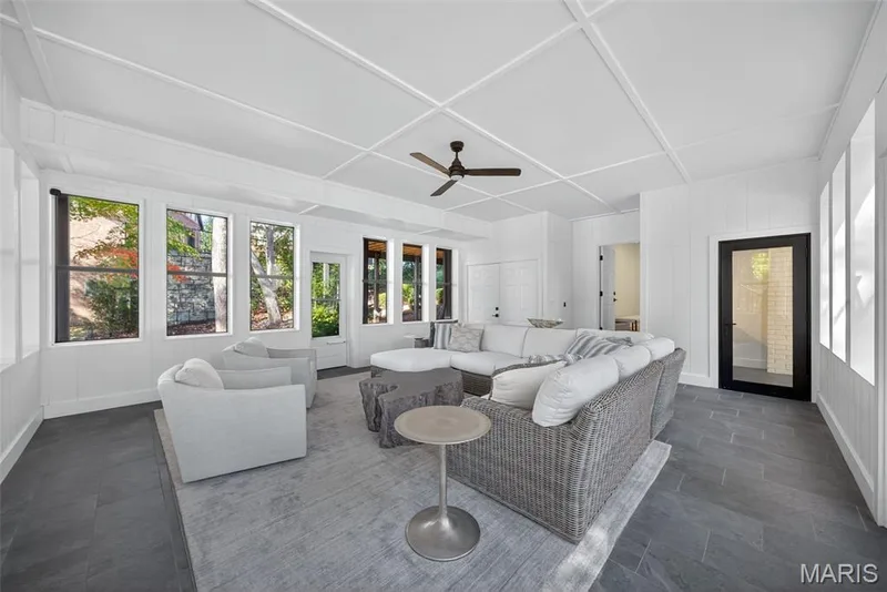 Four Seasons room with access to a lower level full bathroom, living room, lower patio, and of course the boat dock! — 22 Holloway Drive, Lake St. Louis, MO 63367