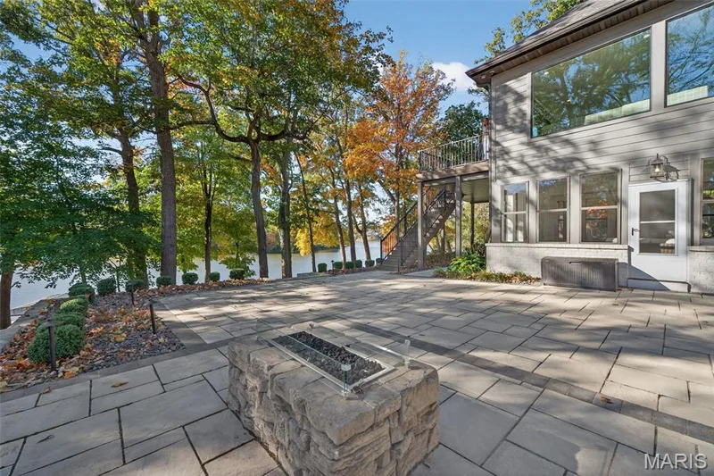Lower level paver patio with gas outdoor fireplace — 22 Holloway Drive, Lake St. Louis, MO 63367