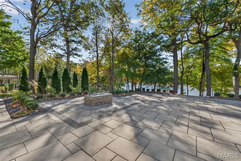 Gas fireplace on lower level patio — 22 Holloway Drive, Lake St. Louis, MO 63367