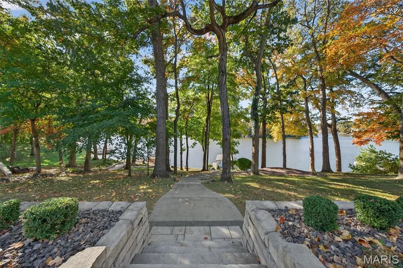 Stairs to the covered boat dock with lift — 22 Holloway Drive, Lake St. Louis, MO 63367