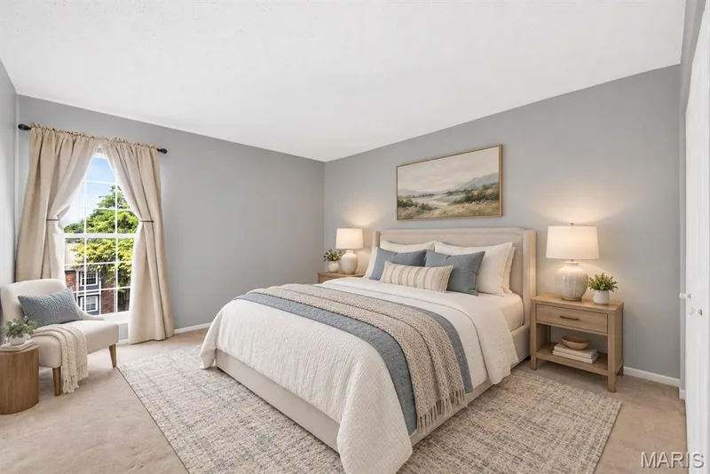 Carpeted flooring, window with natural light, and a light-toned ceiling — 14443 Bantry Lane #16, Chesterfield, MO 63017