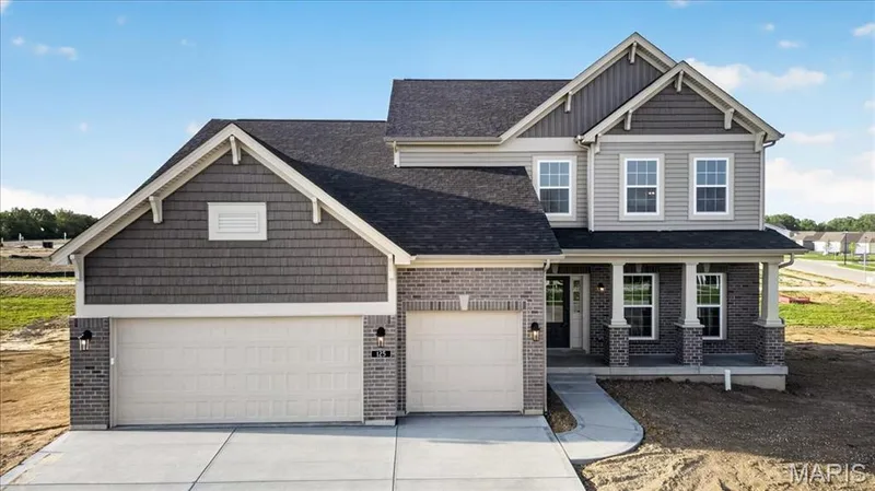 The Bridgeport expanded plan -elevation 8 by Consort Homes with 12x20 patio, 8 ft Ingrade foundation and 3 car garage — 125 Sterling Drive, Lake St. Louis, MO 63367