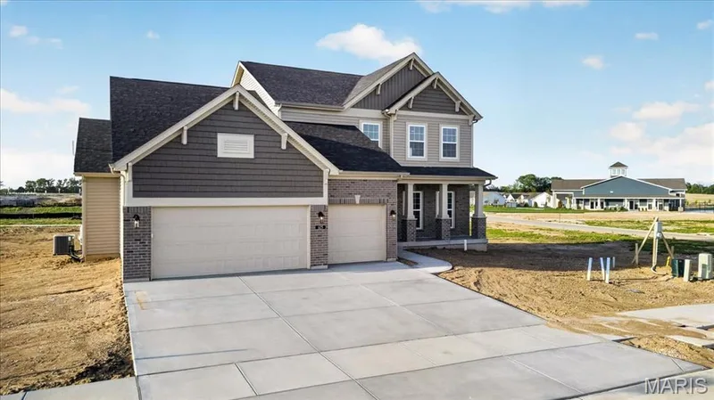 The Bridgeport expanded plan -elevation 8 by Consort Homes with 12x20 patio, 8 ft Ingrade foundation and 3 car garage — 125 Sterling Drive, Lake St. Louis, MO 63367
