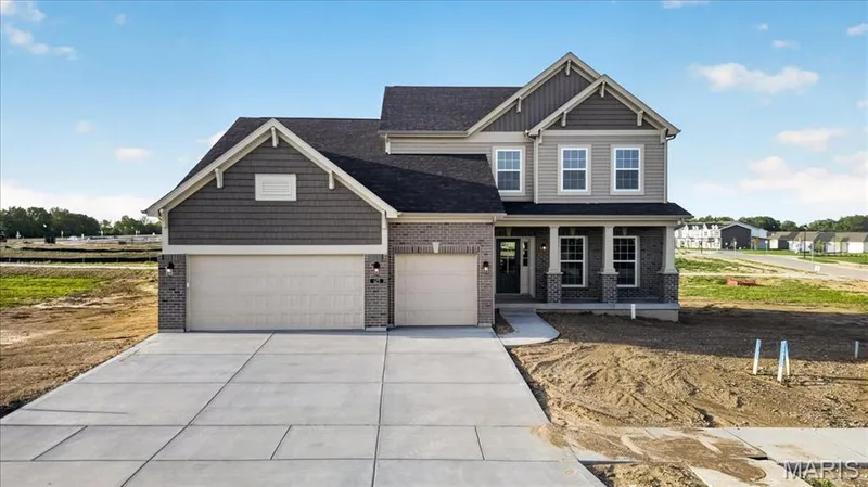 The Bridgeport expanded plan -elevation 8 by Consort Homes with 12x20 patio, 8 ft Ingrade foundation and 3 car garage — 125 Sterling Drive, Lake St. Louis, MO 63367