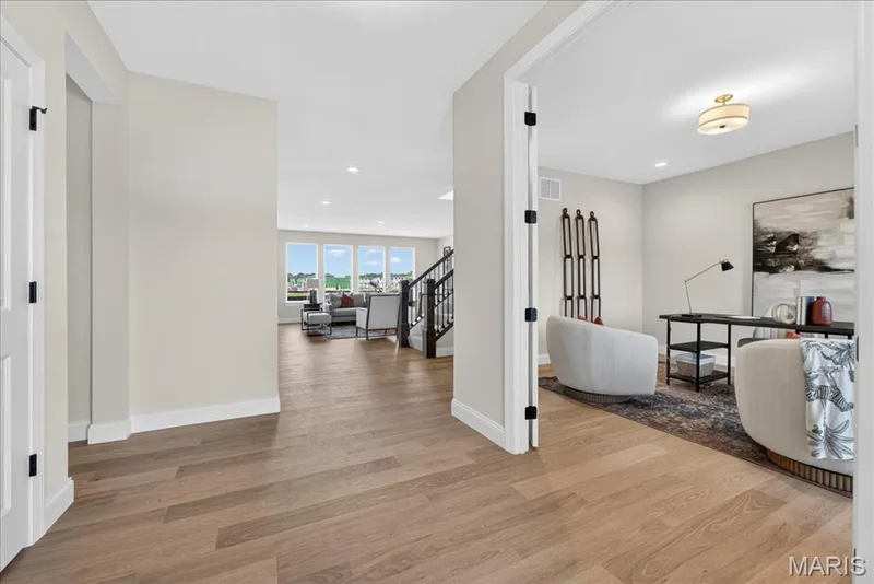 Entrance foyer with a view of the study — 125 Sterling Drive, Lake St. Louis, MO 63367