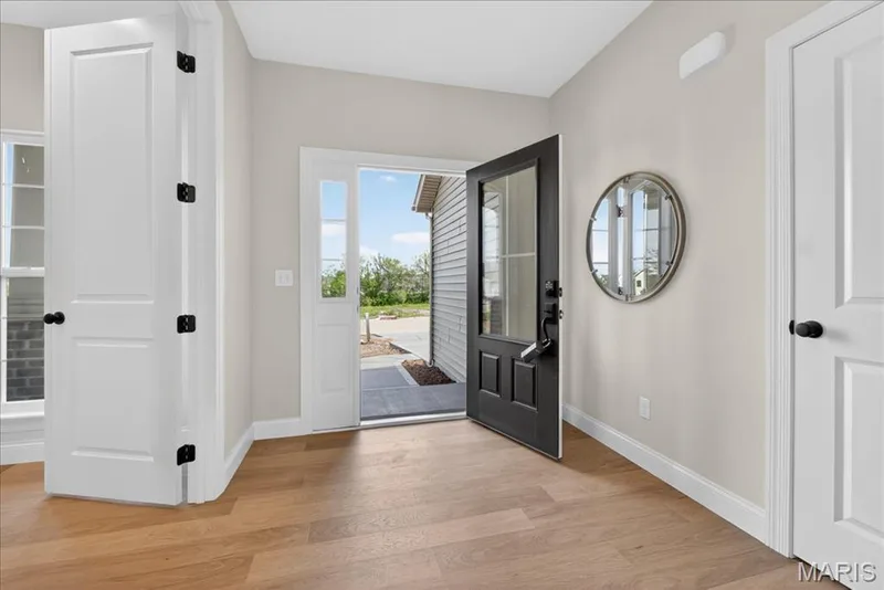 Entrance foyer view of front door — 125 Sterling Drive, Lake St. Louis, MO 63367