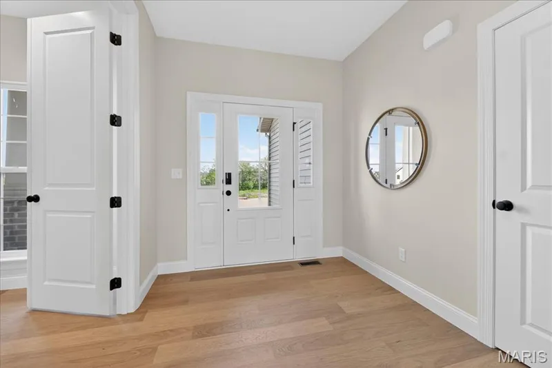 Entrance foyer view of front door — 125 Sterling Drive, Lake St. Louis, MO 63367