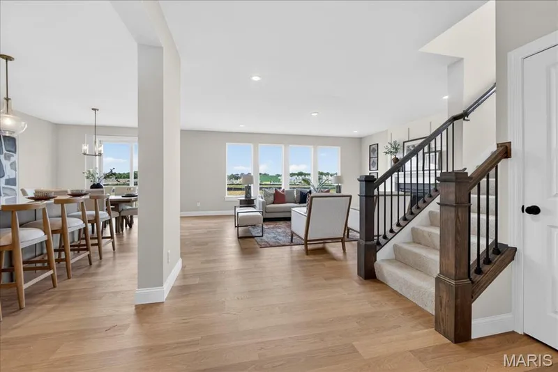 Hallway view of Kitchen and Family room — 125 Sterling Drive, Lake St. Louis, MO 63367