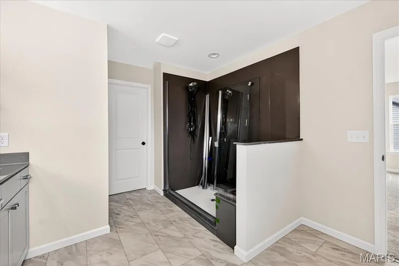 Primary Bathroom with vanity and a stall shower — 210 Randlin Drive, O'Fallon, MO 63367